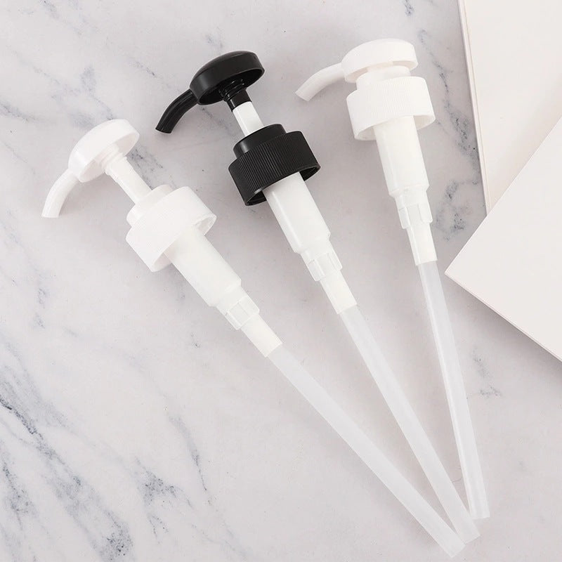 In-stock 32-tooth plastic black and white round-head pump, suitable for shampoo, lotion, shower gel, and body lotion. features a threaded pump head