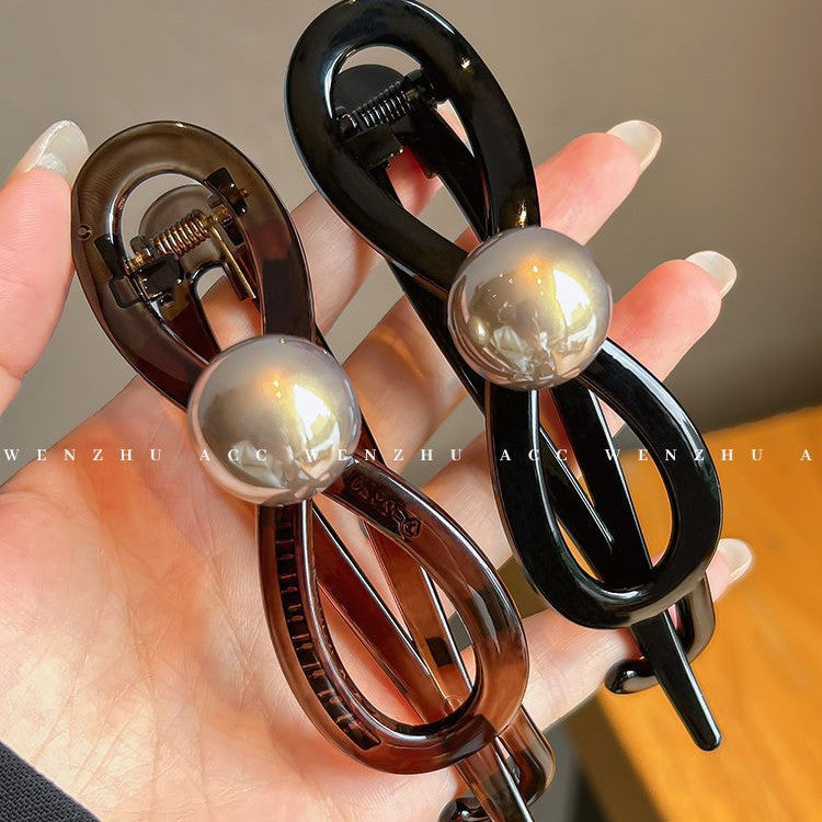 Classy sense twist hair clip for women, back of head hair clip, shark clip, 2024 new style pearl bow one-word clip