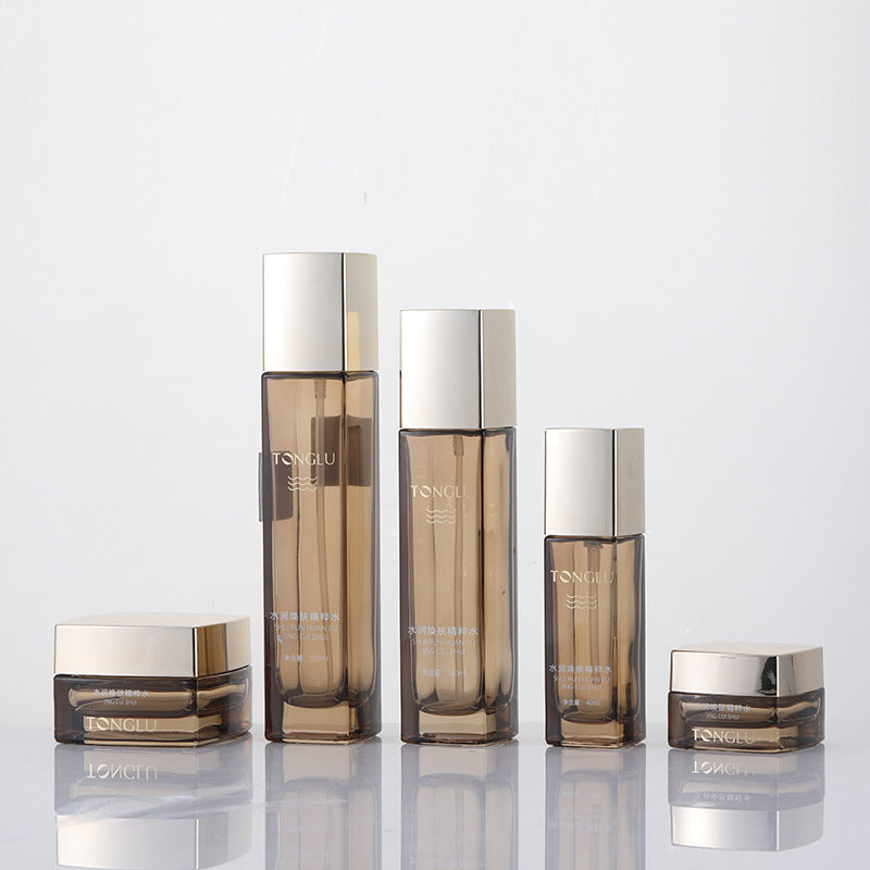 Ready-to-ship cosmetic glass bottle set packaging, including 120ml high-end lotion/essential oil decanters and 50g cream jars