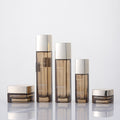 Ready-to-ship cosmetic glass bottle set packaging, including 120ml high-end lotion/essential oil decanters and 50g cream jars