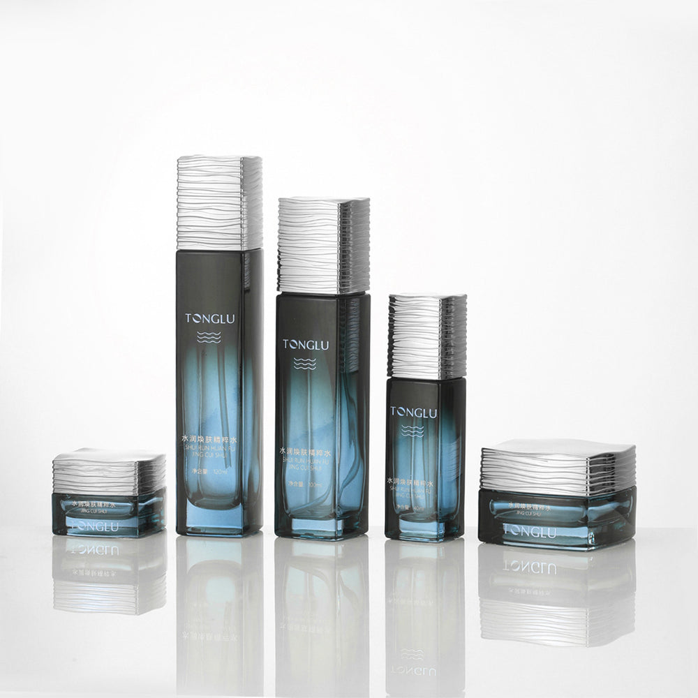 Cosmetic glass bottle set packaging material 120ml lotion essential oil dispensing glass bottle 50g cream jar manufacturer supply