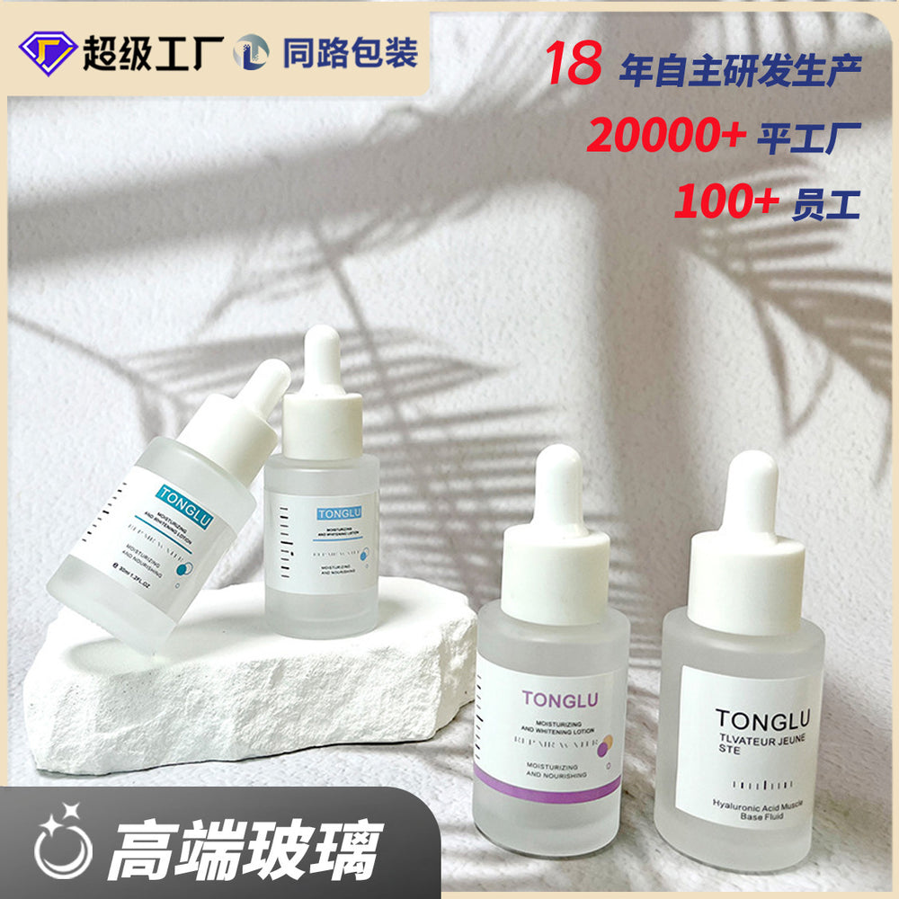 Ready-to-ship cosmetic glass bottles and packaging materials: 30ml essential oil bottles, dropper essential oil dispensing bottles, and serum/essence glass bottles