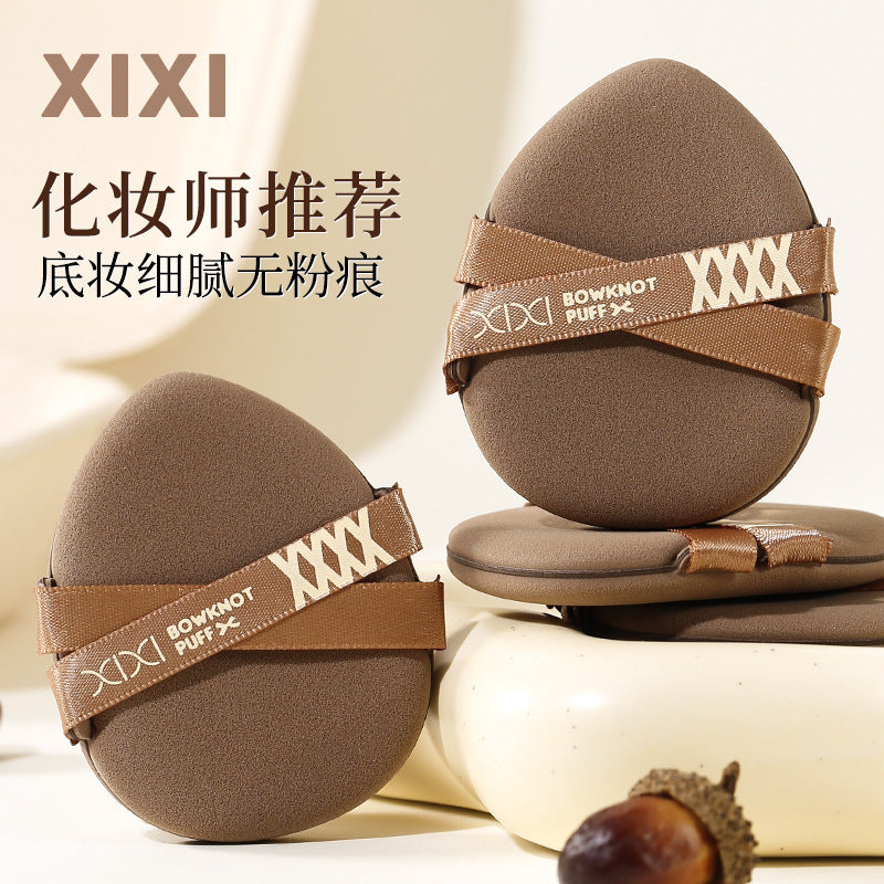 Xixi double ribbon soft air cushion puff does not eat powder and becomes larger when exposed to water. dry and wet dual-use powder bottom special makeup sponge