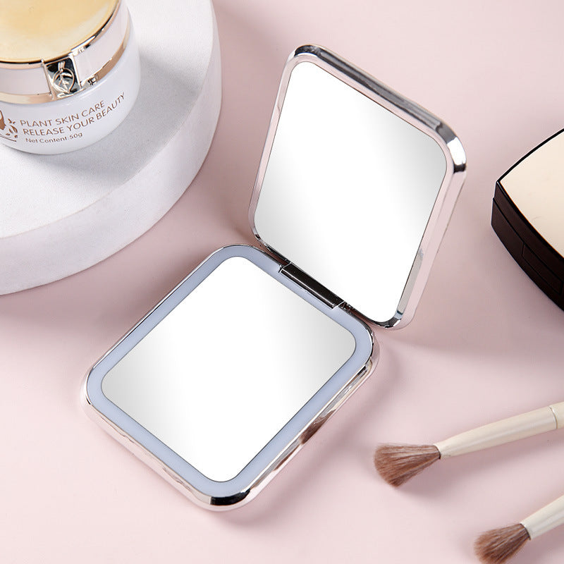 Portable led makeup mirror - foldable, electroplated, lighted plastic handheld double-sided mirror for home use