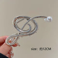 Silver note [about 12cm long]