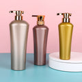 Ready-to-ship pet blow-molded dispensing bottles. gold-colored bottles for shower gel, shampoo, conditioner, lotion, and other liquids. empty plastic pump bottles