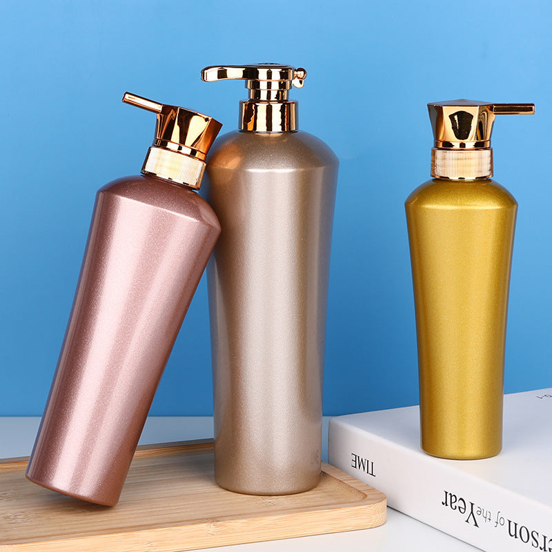 Ready-to-ship pet blow-molded dispensing bottles. gold-colored bottles for shower gel, shampoo, conditioner, lotion, and other liquids. empty plastic pump bottles
