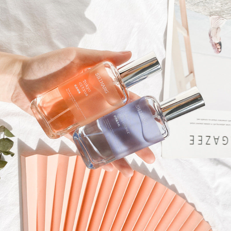 Perfume wholesale girly heart long-lasting light fragrance osmanthus milk in stock new model stranger grapefruit perfume for women