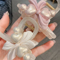 Korean style heart pearl claw clip - ethereal hair clip for women, back of head style, high-end shark clip with bowknot hair accessory