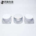 Ready-to-ship cosmetic cream jars, 50g frosted glass bottles with electroplated lids, available in square, round, and transparent wide-mouth styles