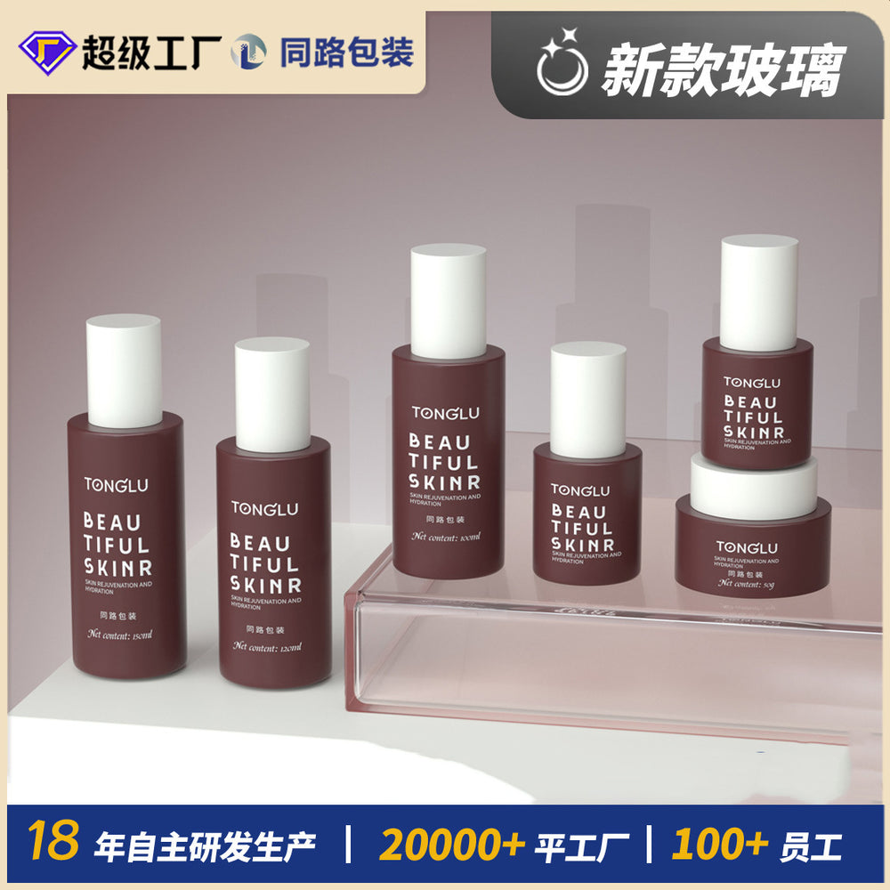Factory direct sales cosmetic glass bottle suit packaging material 120ml lotion essential oil refill bottle 50g skin care cream bottle