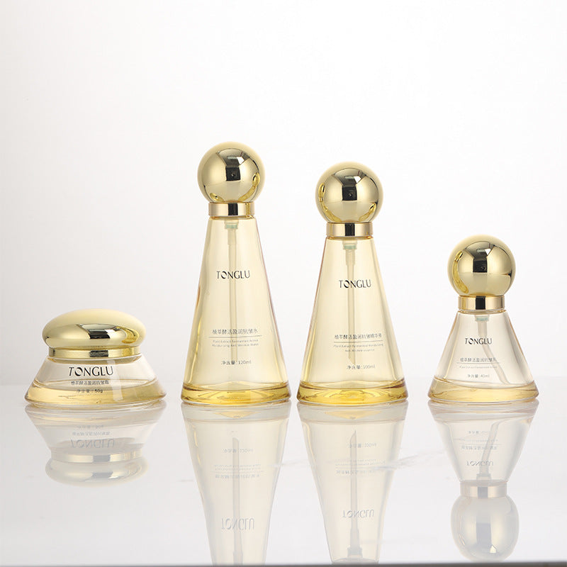 New round cap transparent glass bottle - serum & skincare set: lotion, essence, and serum bottles for skincare packaging