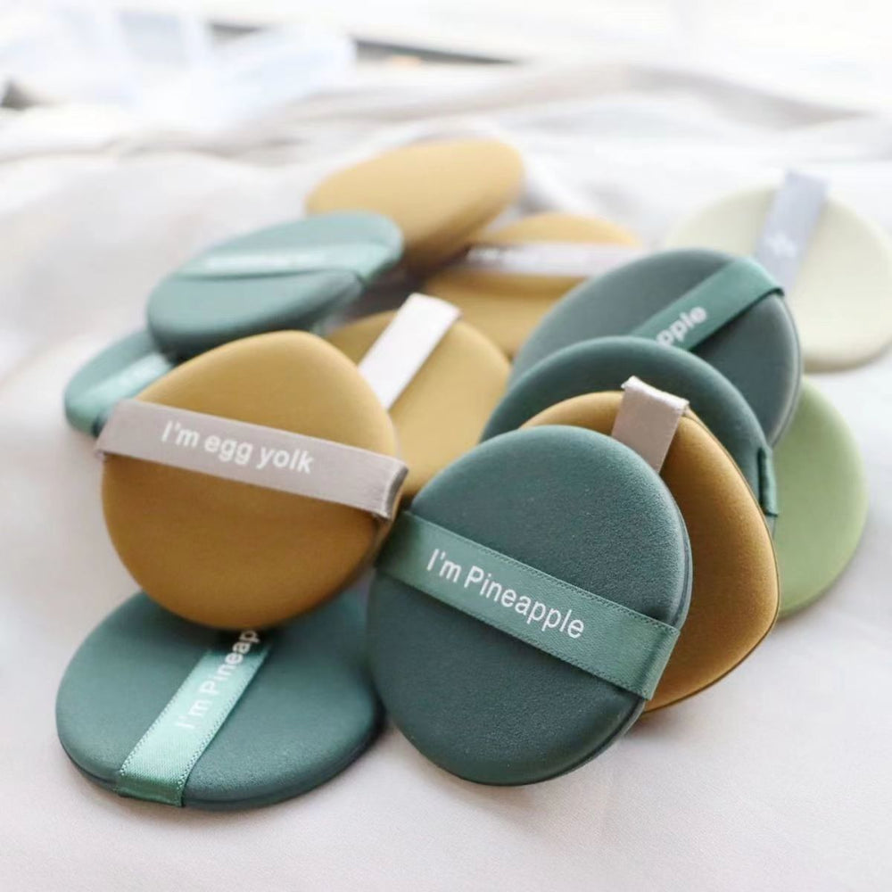 Best selling egg yolk pie powder puff air cushion no powder makeup powder bottom liquid sponge powder puff dry and wet dual use pineapple pie powder puff