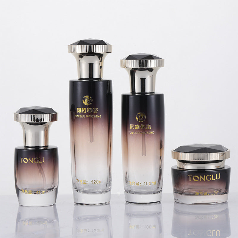 Ready-to-ship skincare glass bottle set packaging, including 120ml lotion/serum glass bottles and 50g cream/jar dispensing containers