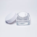 Ready-to-ship cosmetic cream jars, 50g frosted glass bottles with electroplated lids, available in square, round, and transparent wide-mouth styles