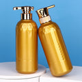 Ready-to-ship pet blow-molded dispensing bottles. gold-colored bottles for shower gel, shampoo, conditioner, lotion, and other liquids. empty plastic pump bottles
