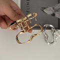 Niche liquid asymmetrical line metal hair clip for women, back of the head gripper, medium shark clip, classypopular hair gripper