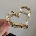 Metallic heart claw clip - new women's fashion, elegant, minimalist, versatile small shark clip, light luxury style, high-end hair accessory