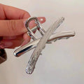 Silver small x [about 6cm long]