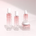 Ready-to-ship cosmetic glass bottle set packaging, including 120ml lotion/serum glass bottles and 50g cream jars, direct from the manufacturer