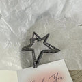 Gun black star [about 7cm long]