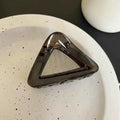 Small triangle transparent gray [7.5cm]
