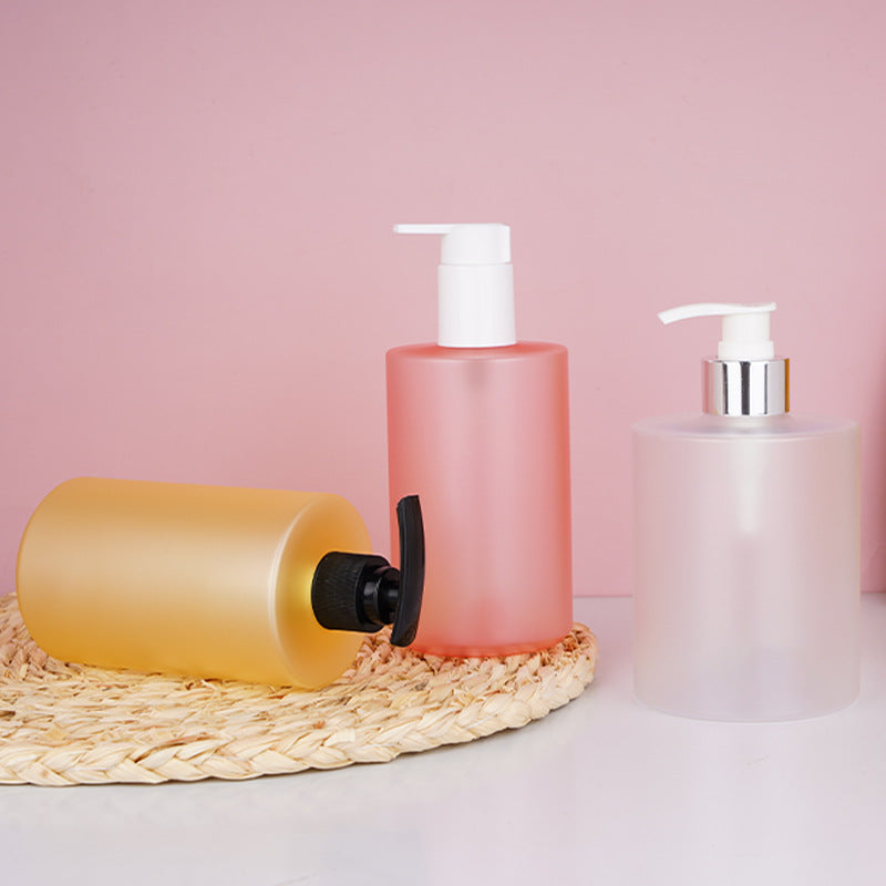 Customizable empty plastic bottles for shampoo, conditioner, and body wash - flat shoulder, pump dispenser, refillable