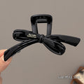 Bow letter bright black-12.5cm