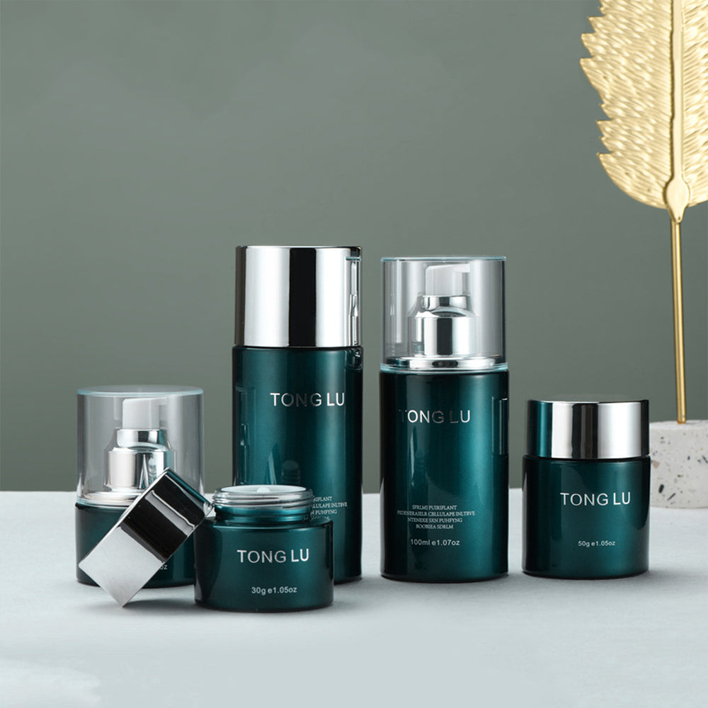 Ready-to-ship cosmetic glass bottle set packaging, including 30ml pump-style essential oil dispensing bottles and 30g glass jars for skincare creams and lotions