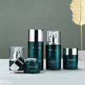 Ready-to-ship cosmetic glass bottle set packaging, including 30ml pump-style essential oil dispensing bottles and 30g glass jars for skincare creams and lotions
