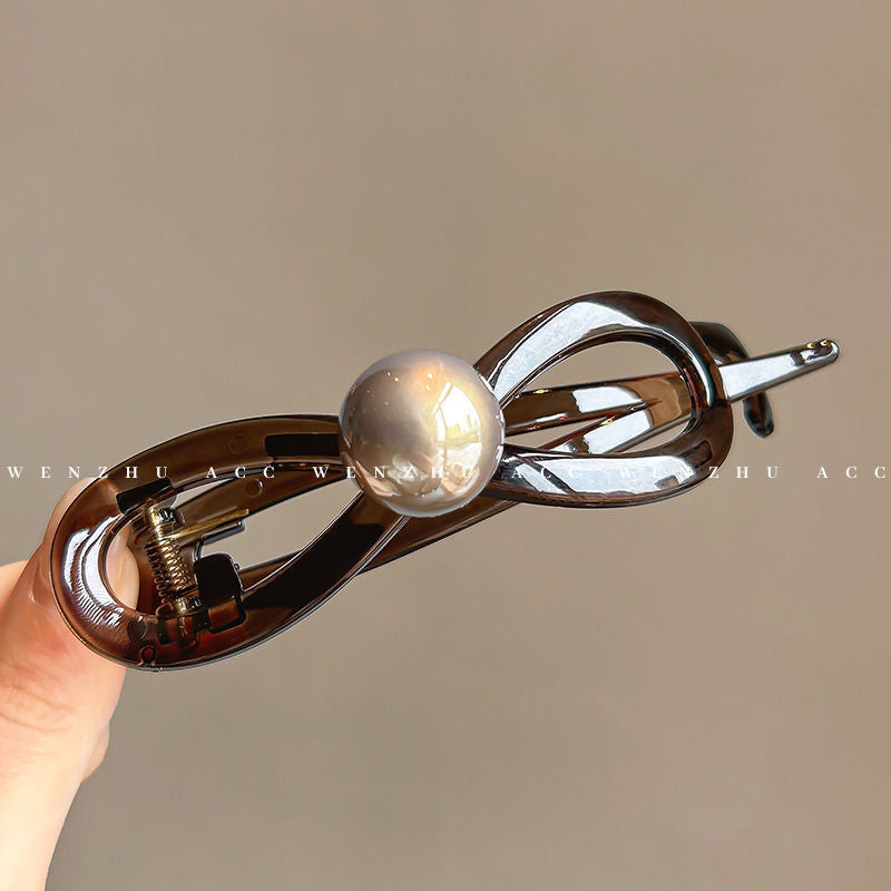Classy sense twist hair clip for women, back of head hair clip, shark clip, 2024 new style pearl bow one-word clip