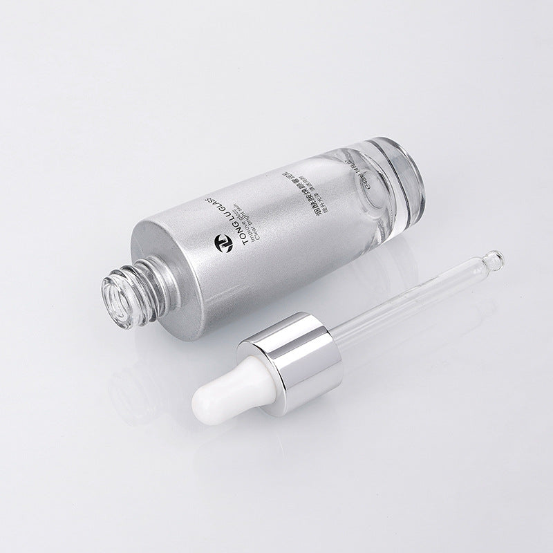 New cosmetic packaging glass bottle essence glass bottle 30ml plastic tip dropper glass bottle manufacturer wholesale