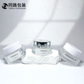 Ready-to-ship cosmetic cream jars, 50g frosted glass bottles with electroplated lids, available in square, round, and transparent wide-mouth styles