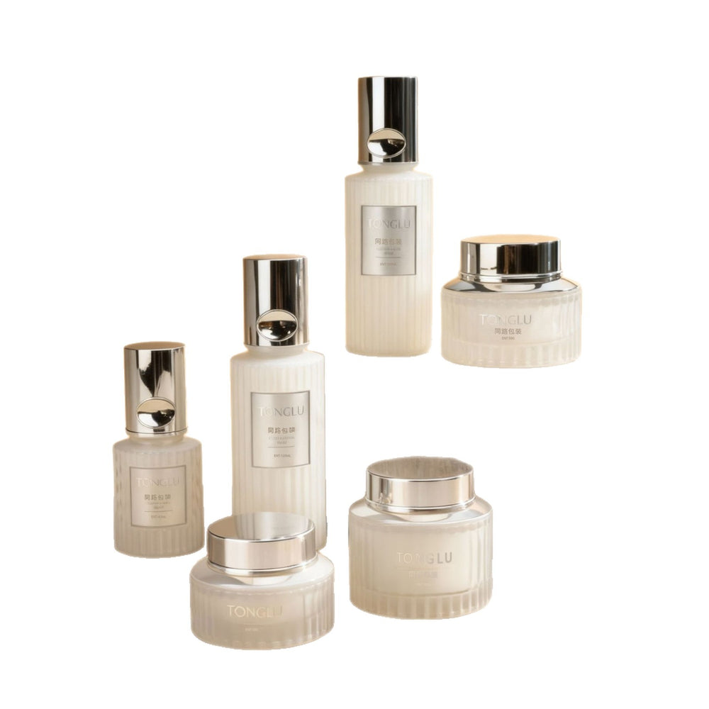 Custom manufacturer 120ml press-type lotion & serum dispenser bottles, 100g large capacity cream & balm glass jars wholesale