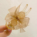 Champagne mesh bow