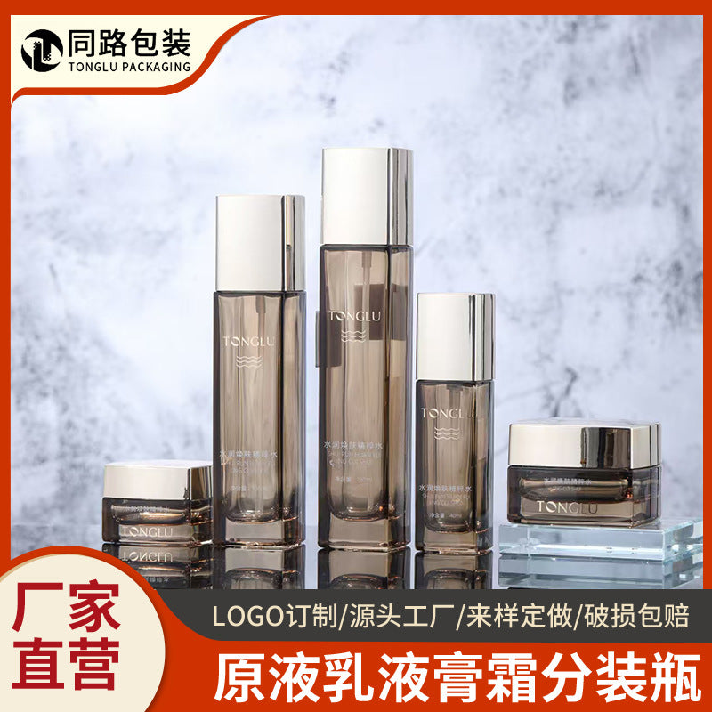 Ready-to-ship cosmetic glass bottle set packaging, including 120ml high-end lotion/essential oil decanters and 50g cream jars