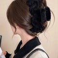Fall and winterstuffed wavy hair clip on the back of the head casualelegant large furry gripper shark clip hairpin headwear wholesale