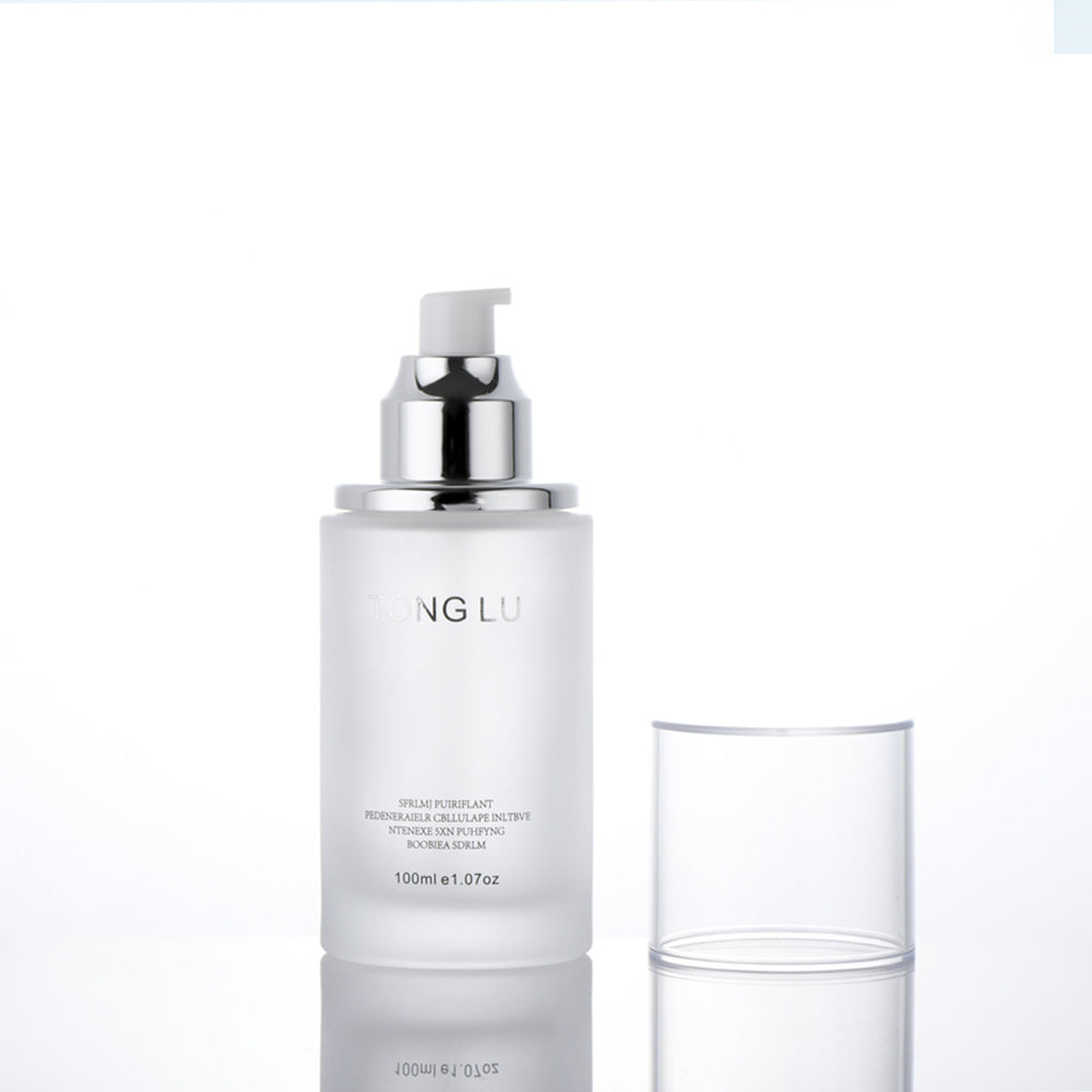 Ready-to-ship cosmetic glass bottle set packaging, including 30ml pump-style essential oil dispensing bottles and 30g glass jars for skincare creams and lotions