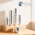 Ready-to-ship skincare sample glass bottles: 120ml spray, 100ml lotion, 40ml serum, 50g eye cream/balm set