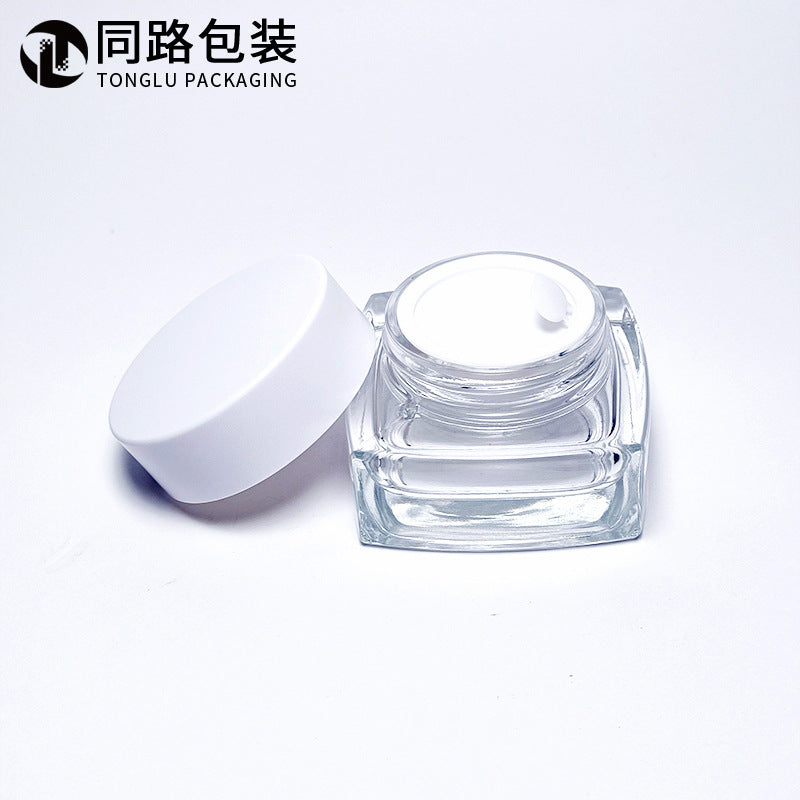 Ready-to-ship cosmetic cream jars, 50g frosted glass bottles with electroplated lids, available in square, round, and transparent wide-mouth styles
