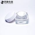 Ready-to-ship cosmetic cream jars, 50g frosted glass bottles with electroplated lids, available in square, round, and transparent wide-mouth styles