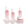 Ready-to-ship cosmetic glass bottle set packaging, including 120ml lotion/serum glass bottles and 50g cream jars, direct from the manufacturer