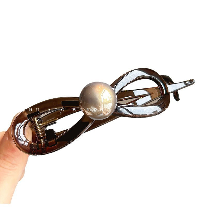 Classy sense twist hair clip for women, back of head hair clip, shark clip, 2024 new style pearl bow one-word clip