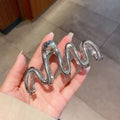 Silver curve [about 11cm long]