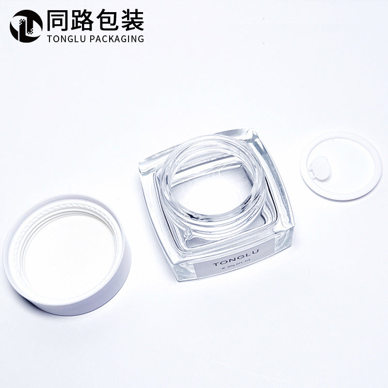 Ready-to-ship cosmetic cream jars, 50g frosted glass bottles with electroplated lids, available in square, round, and transparent wide-mouth styles