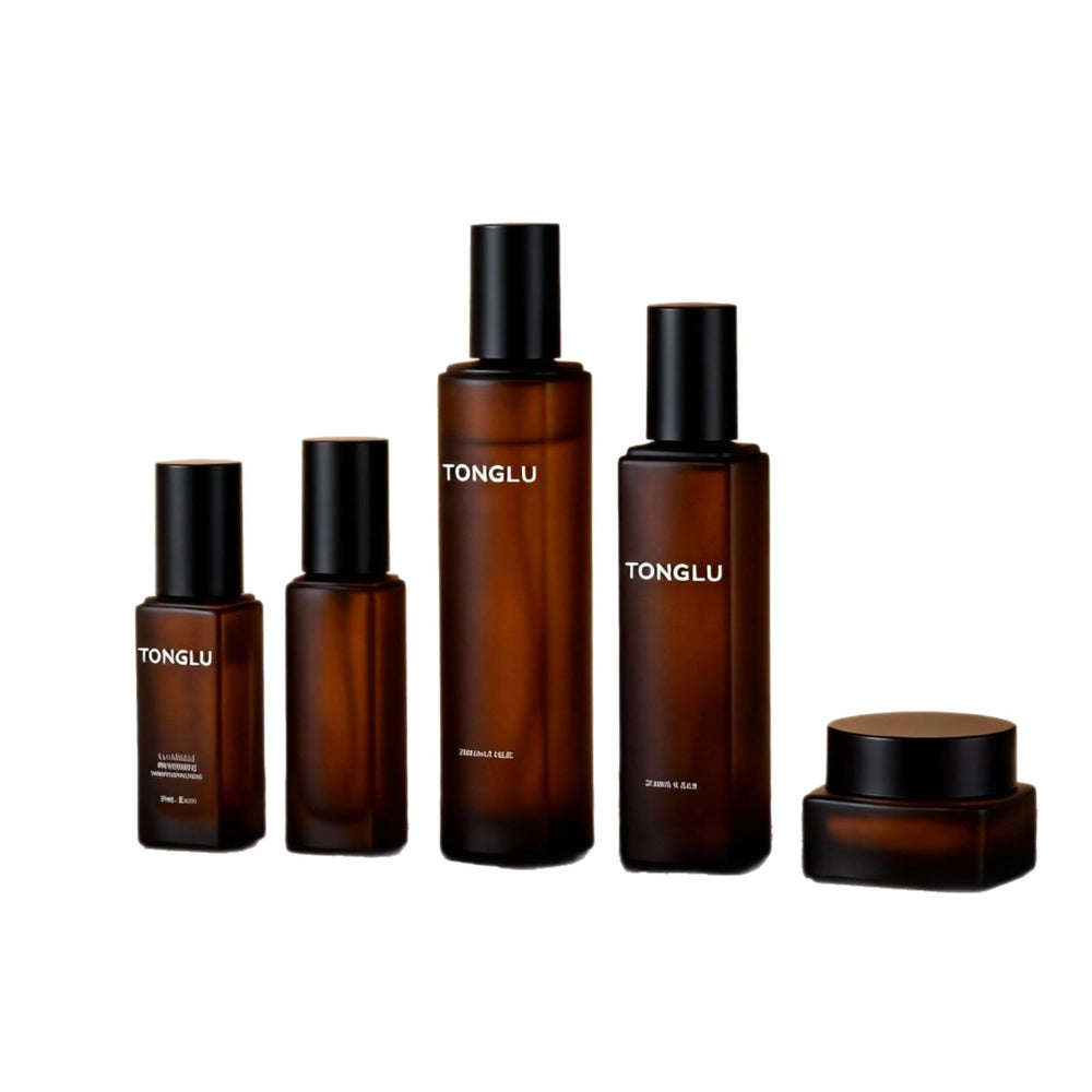 Ready-to-ship cosmetic glass bottle set packaging, including 120ml lotion/serum glass bottles and 50g cream jars, direct from the manufacturer