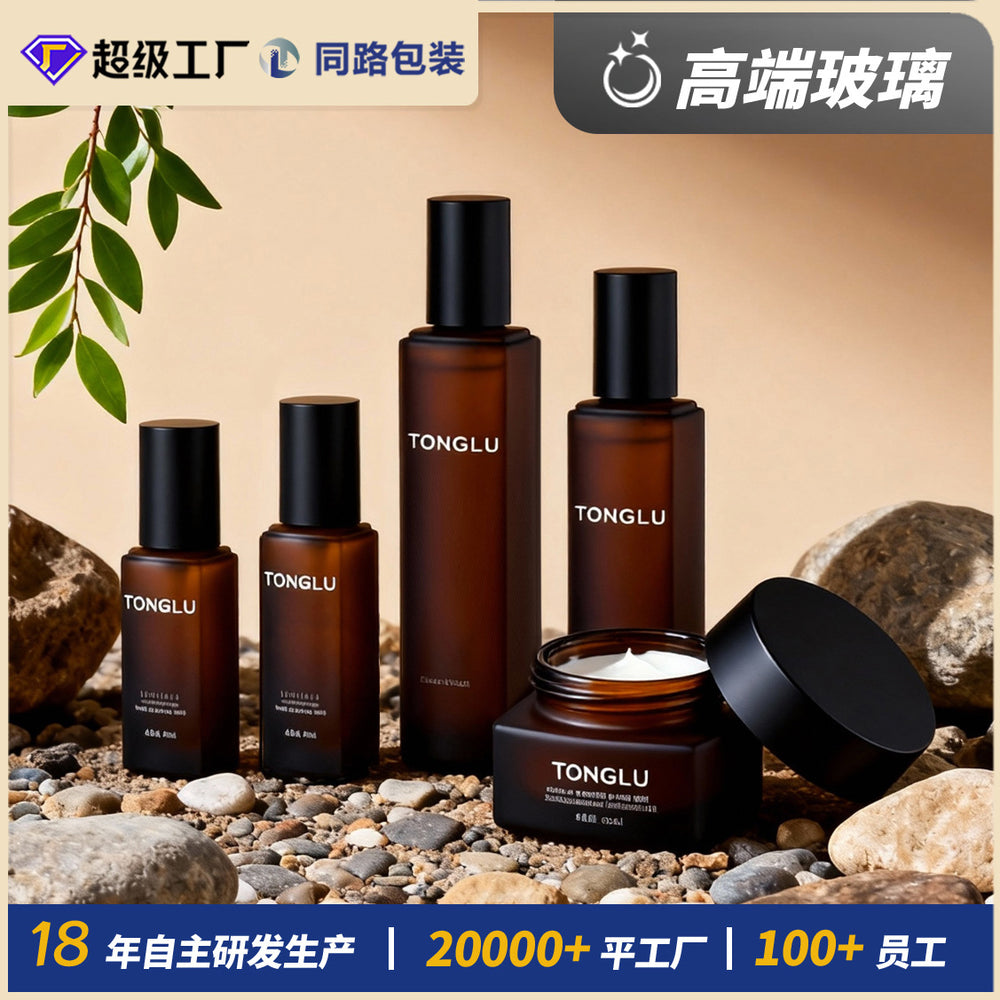 Ready-to-ship cosmetic glass bottle set packaging, including 120ml lotion/serum glass bottles and 50g cream jars, direct from the manufacturer