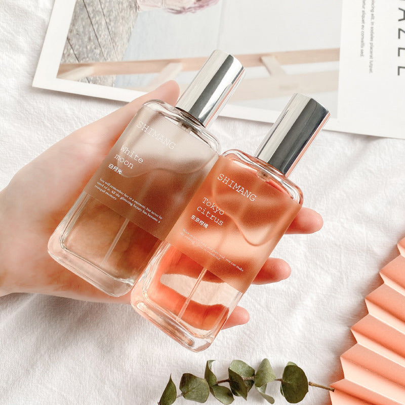 Perfume wholesale girly heart long-lasting light fragrance osmanthus milk in stock new model stranger grapefruit perfume for women