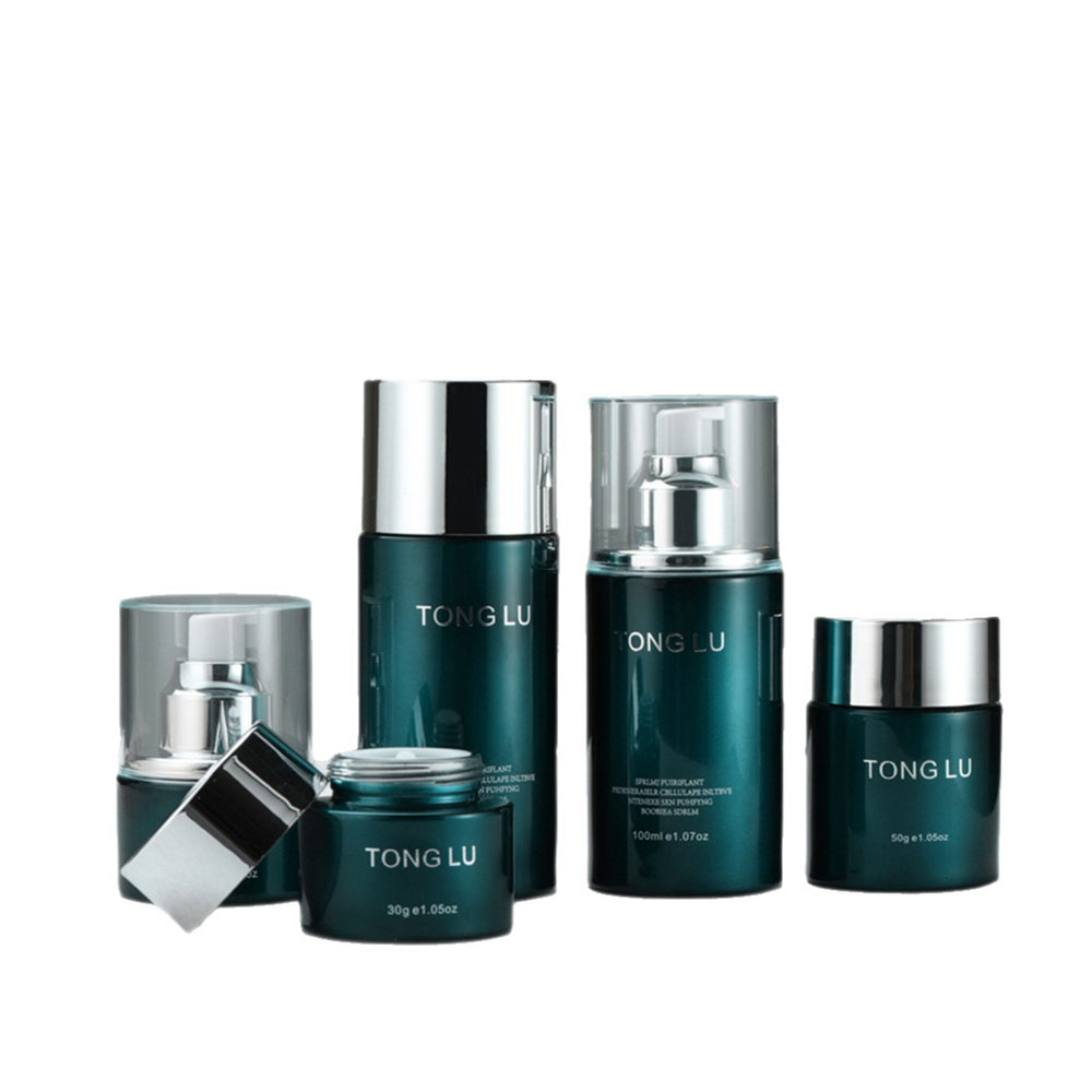 Ready-to-ship cosmetic glass bottle set packaging, including 30ml pump-style essential oil dispensing bottles and 30g glass jars for skincare creams and lotions